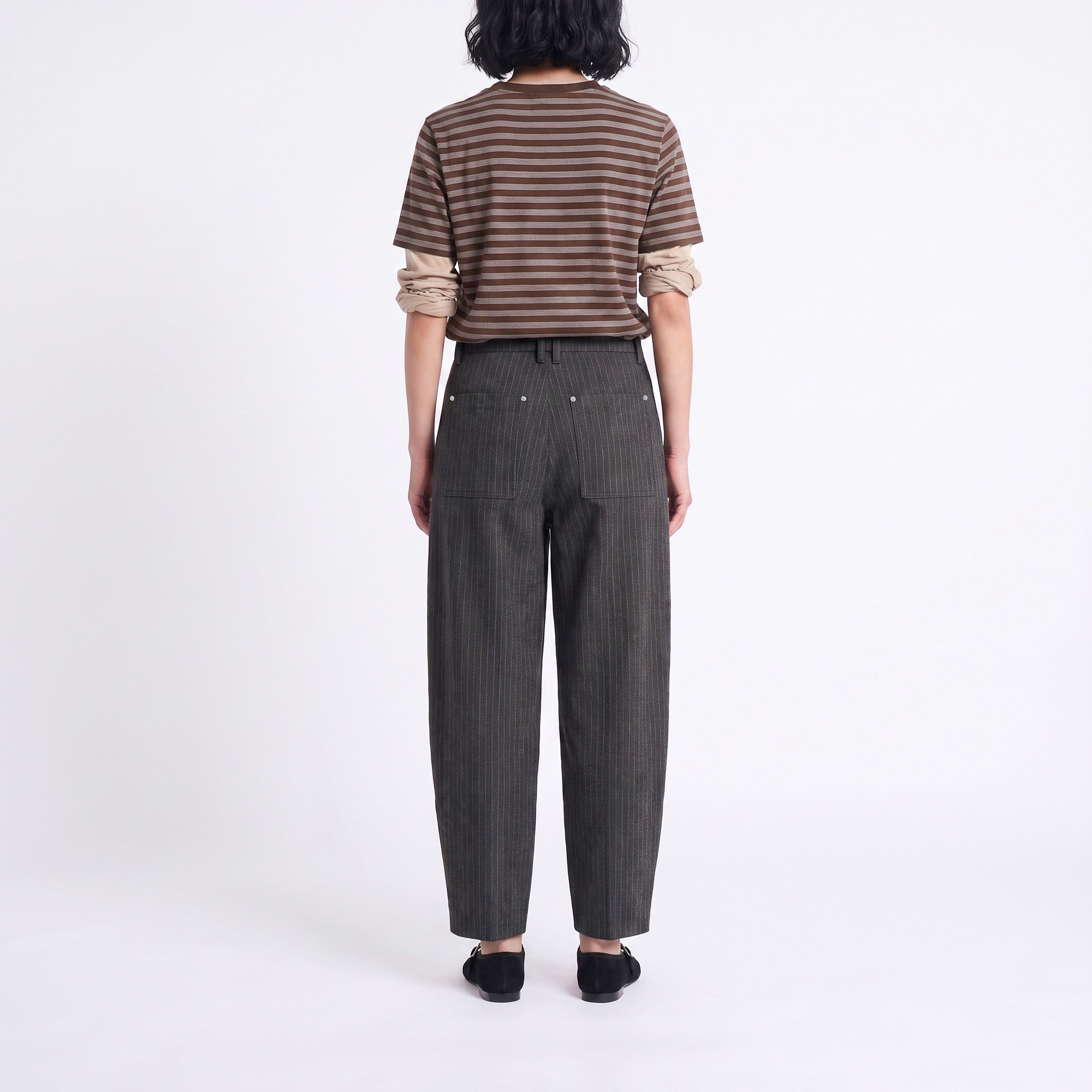 Relaxed trousers made of premium jersey. | TWIST 3.0 | black grey stripes | Back view of model