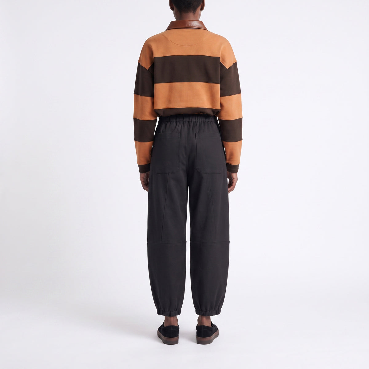 Wide jump-in trousers made of premium flannel. | SHIBUYA 2.0 | black | Back view of model