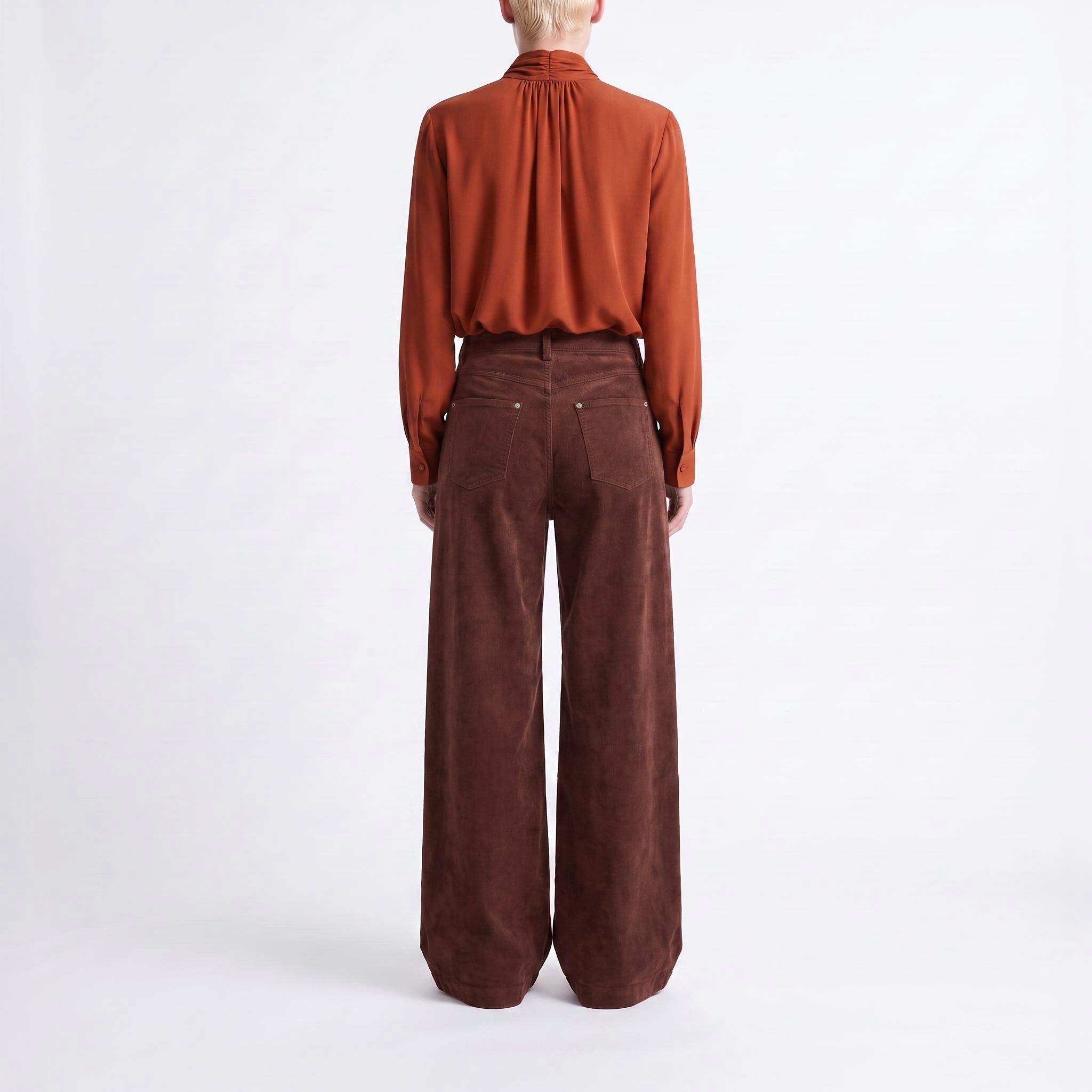 Wide trousers made of fine, soft corduroy. | CLAYTON 2.0 | smoked paprika | Back view of model